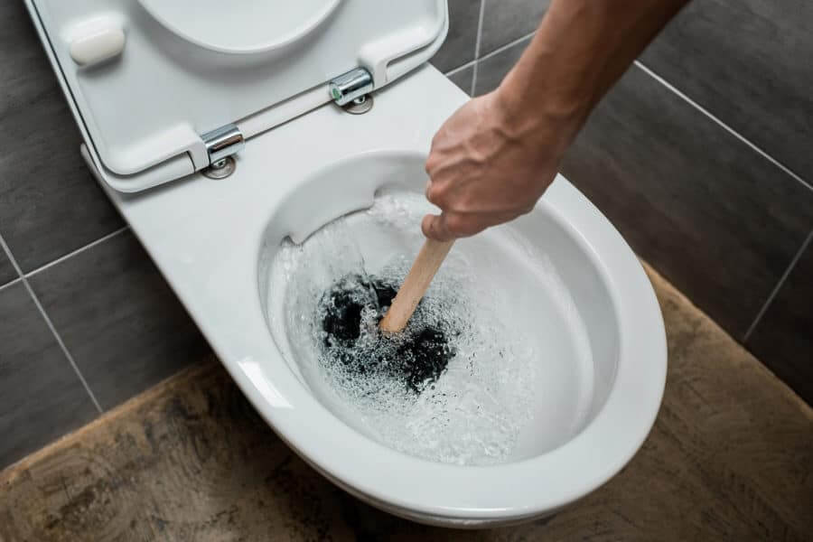 Clogged Pipes cause brown water in toilet